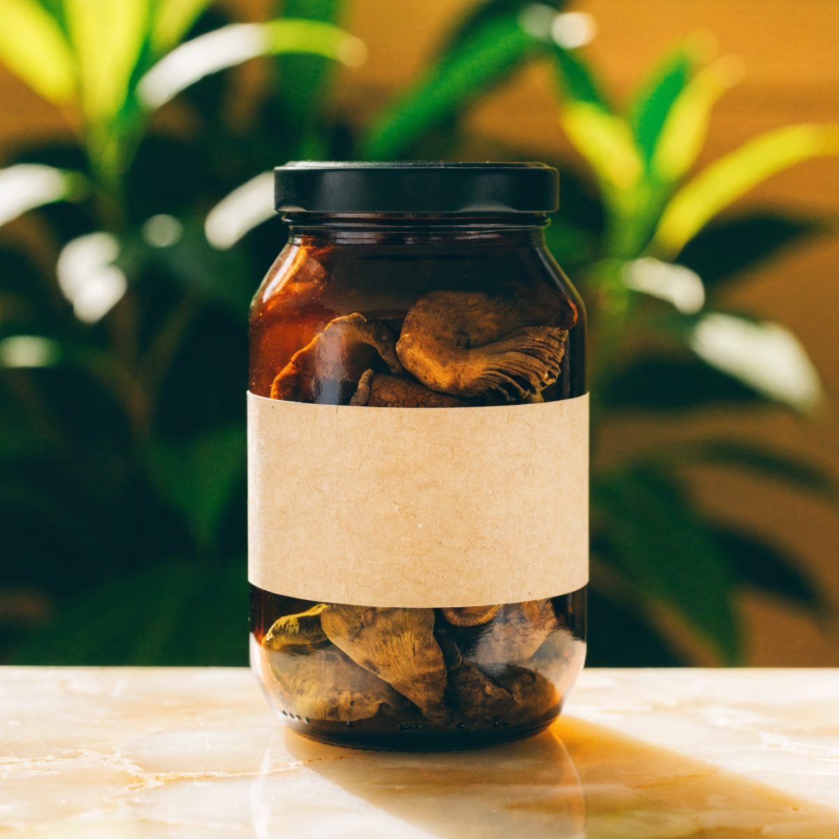 AI packaging concept: amber jar of mushroom seasoning with kraft label